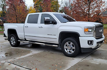 A white truck with tinted windows