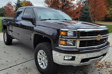 A black truck with tinted windows