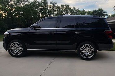 A black car with tinted windows